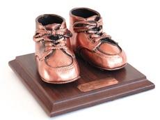 baby shoes in bronze shoes in bronze
